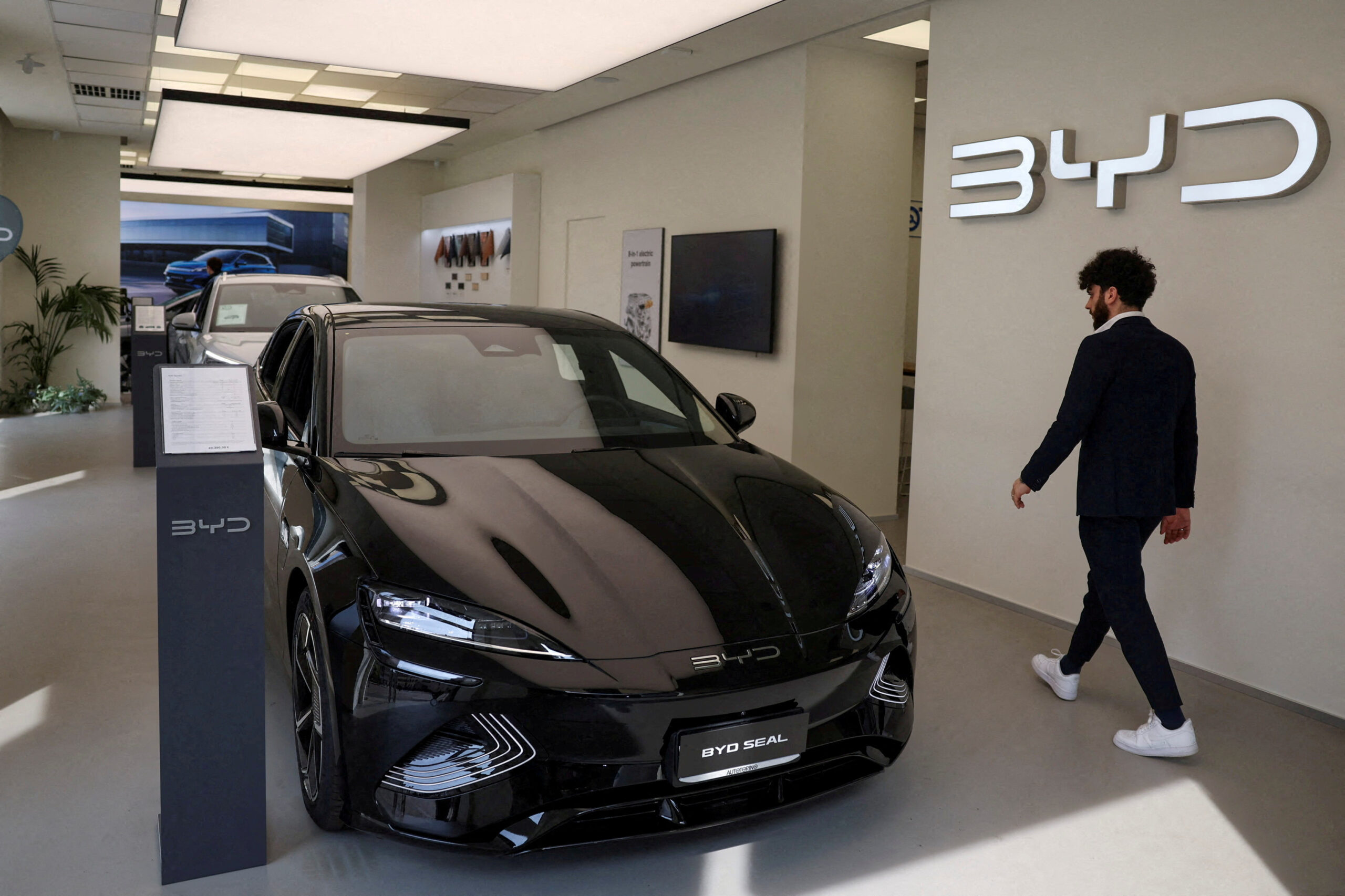 China's Byd Narrows Gap with Tesla nasdaq Tsla After Robust Q2 Ev Sales Growth