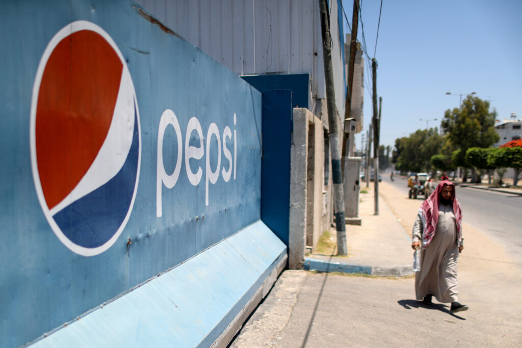 in West Bank Pepsico and Coca cola Bottlers Face Can and Sugar Shortage