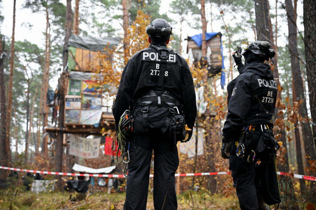 Tesla Plant Protesters Hold out in Trees As German Police Clear Camp