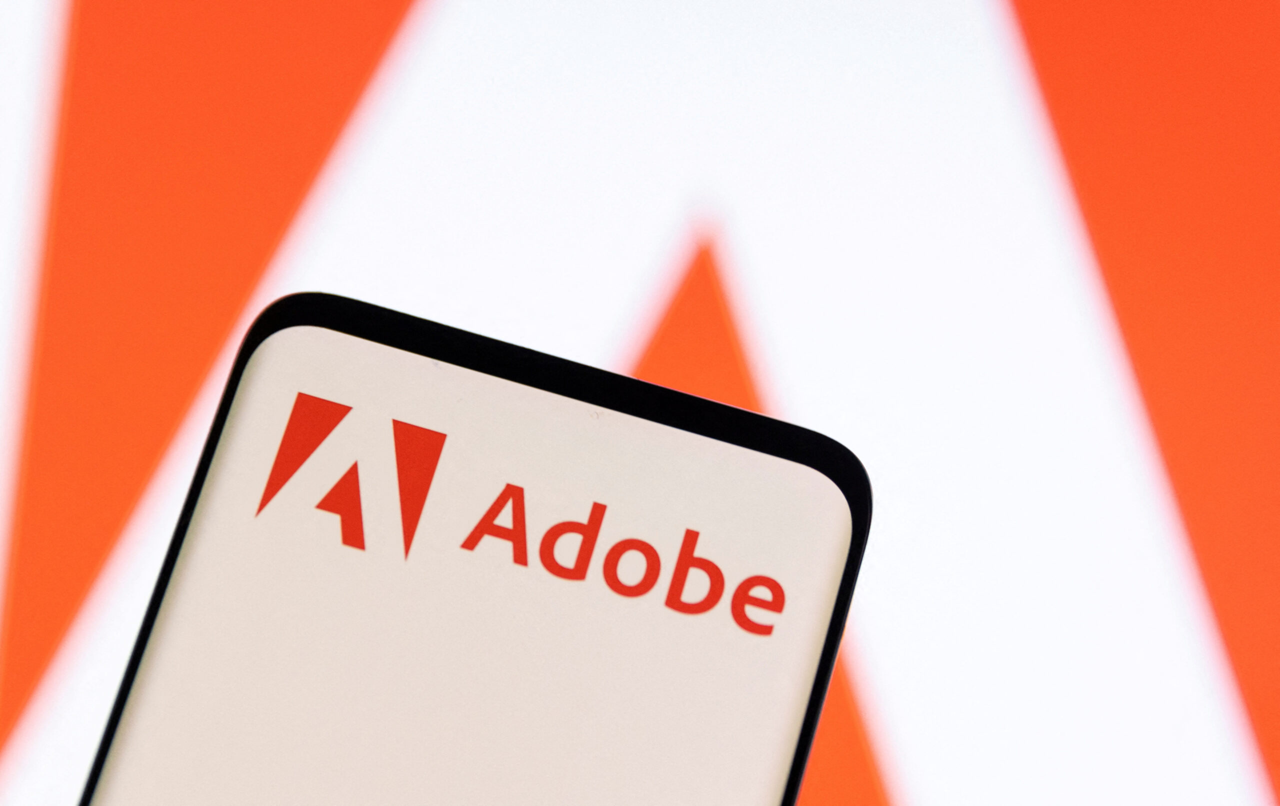 Adobe nasdaq Adbe Shares Fall As Annual Revenue Forecast Raises Concerns over Delayed Ai Returns