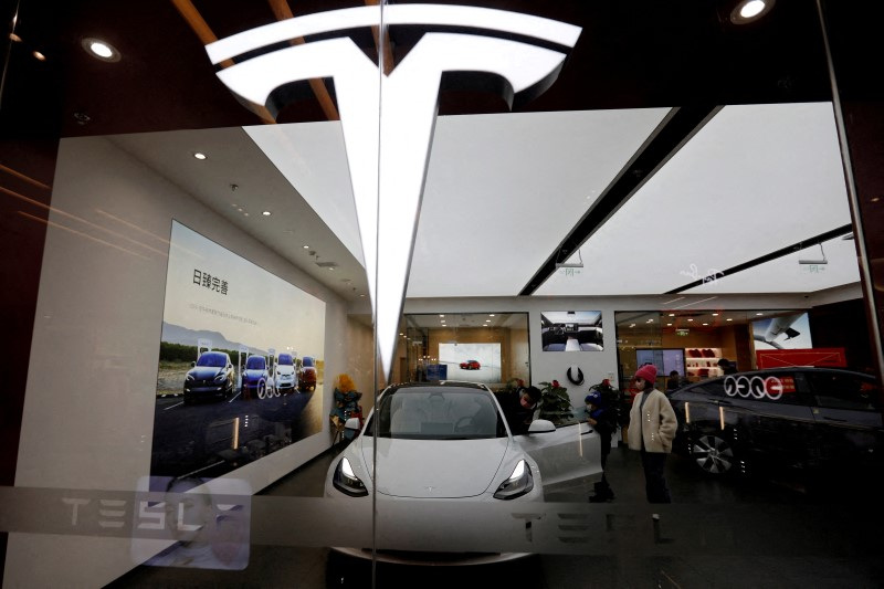 Tesla nasdaq Tsla Stock Jumps to Record High